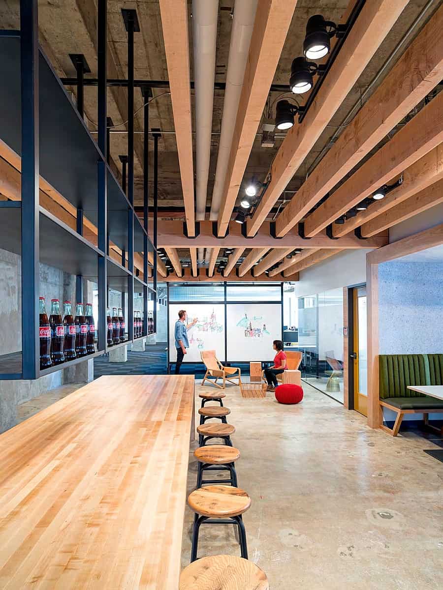 Beautiful wooden surfaces lend the office interiors inviting warmth