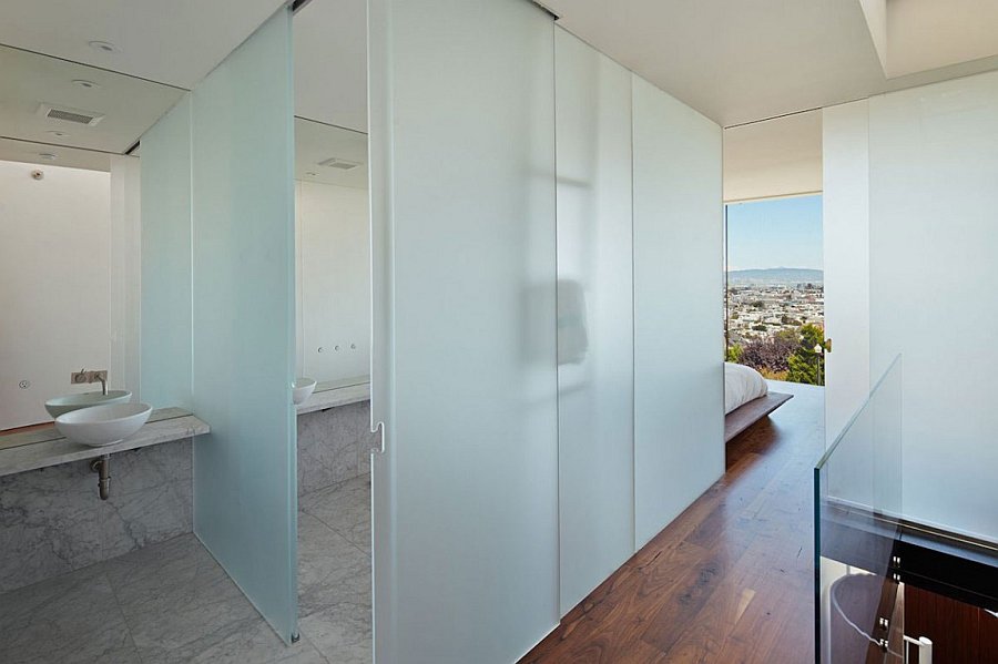 Frosted glass doors for the contemporar bath next to the bedroom