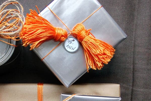 Gift wrap with colorful tassels 10 Gift Wrap Ideas for Design Lovers