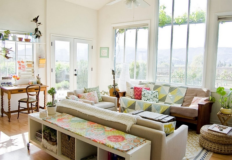 Lovely use of colors and textures in the living room with a high ceiling