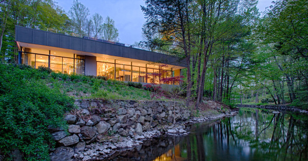 A House That Nestles into its Natural Environment in main architecture Category