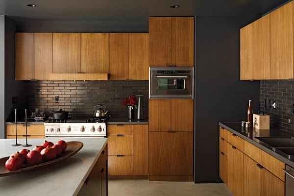 open space kitchen design with wooden furnished cabinets and island