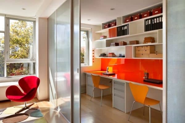 Sleek desks and sliding glass doors make this the perfect study space for kids