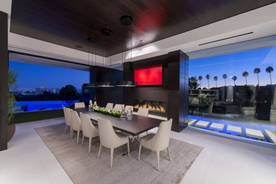 Spacious contemporary dining area with fireplace