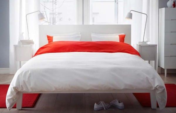 white and orange ikea bedroom