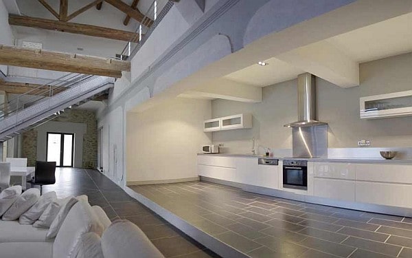 stark white fully fitted open plan kitchen