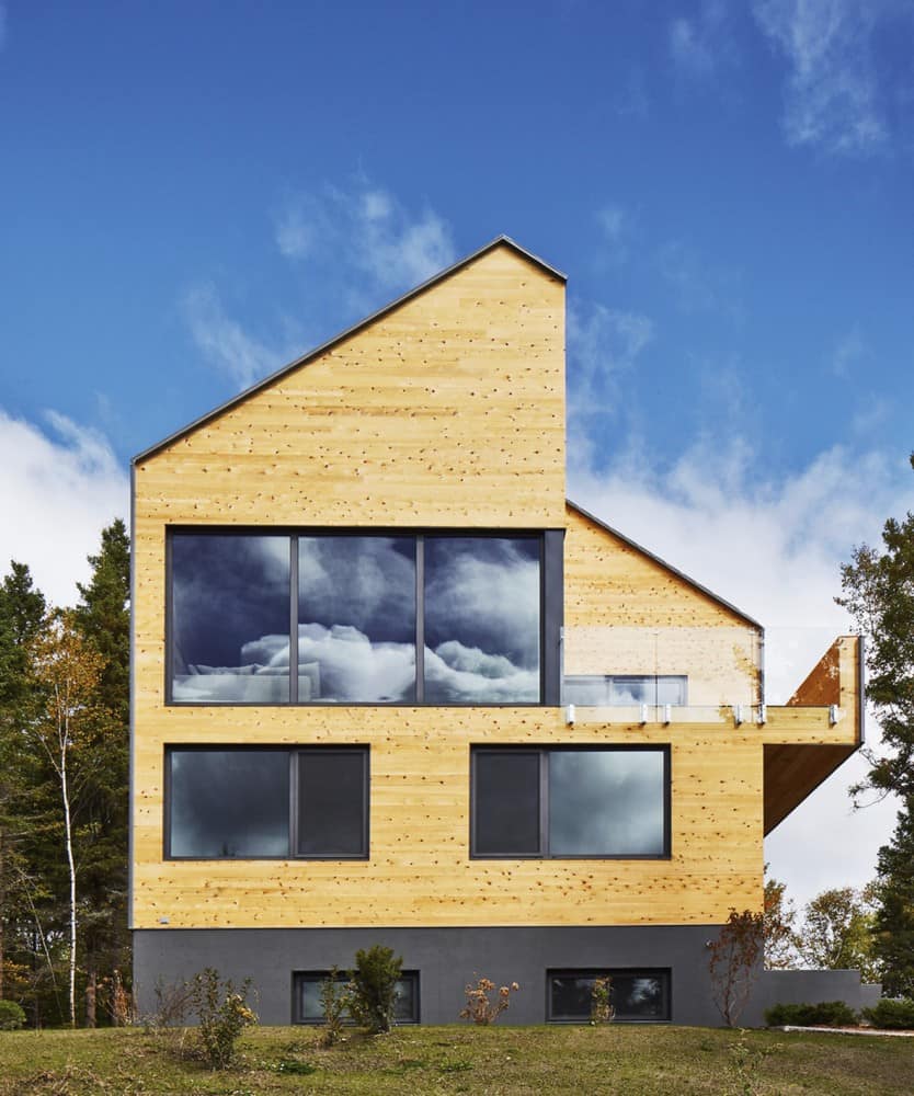 Wooden residence France Wooden residence France Reinterpretation of a Traditional Barn: Malbaie VIII Residence in Canada